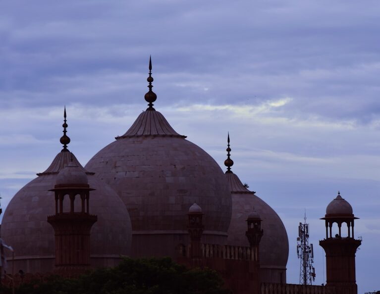 a view of a castle through an archway